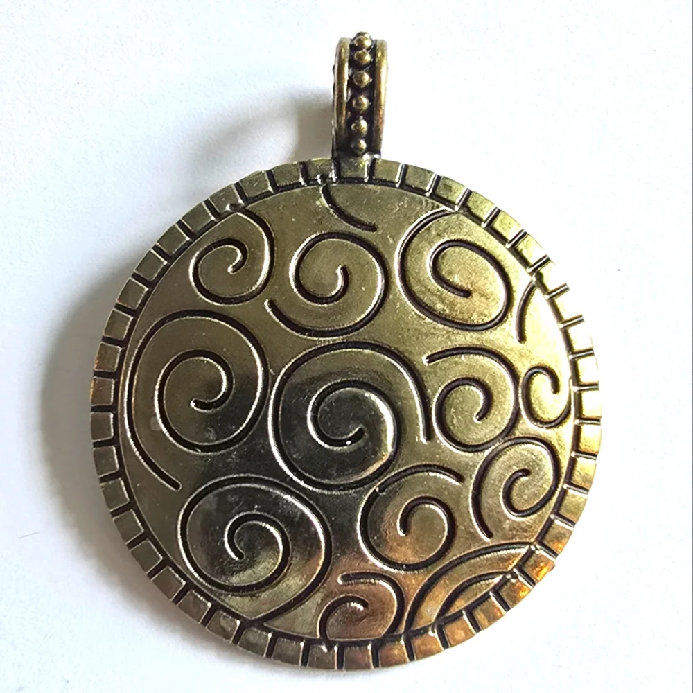 Spiral pendant gold tone domed circle big bold boho